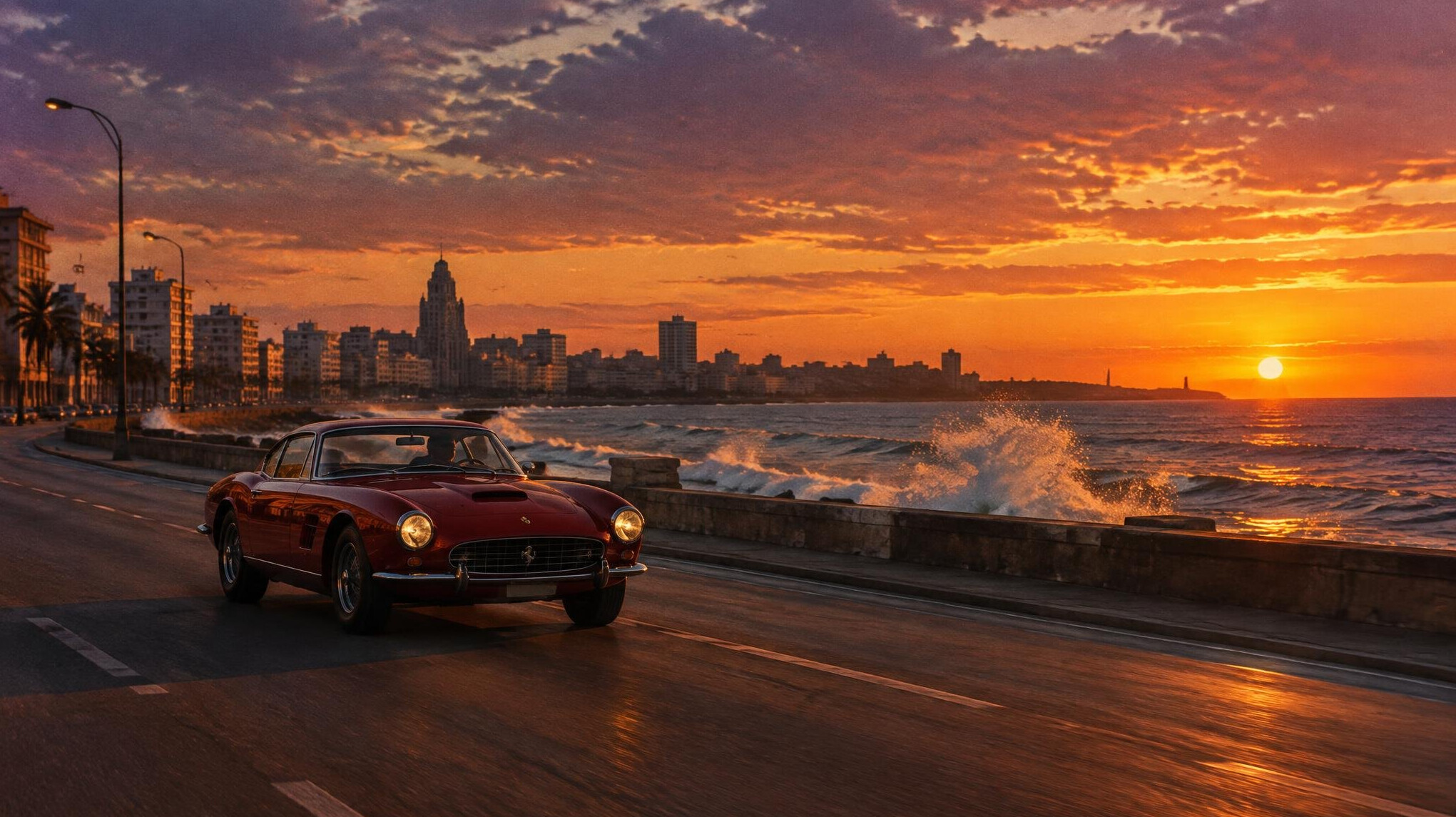 Vintage sports car driving along the Montevideo coastal road at sunset